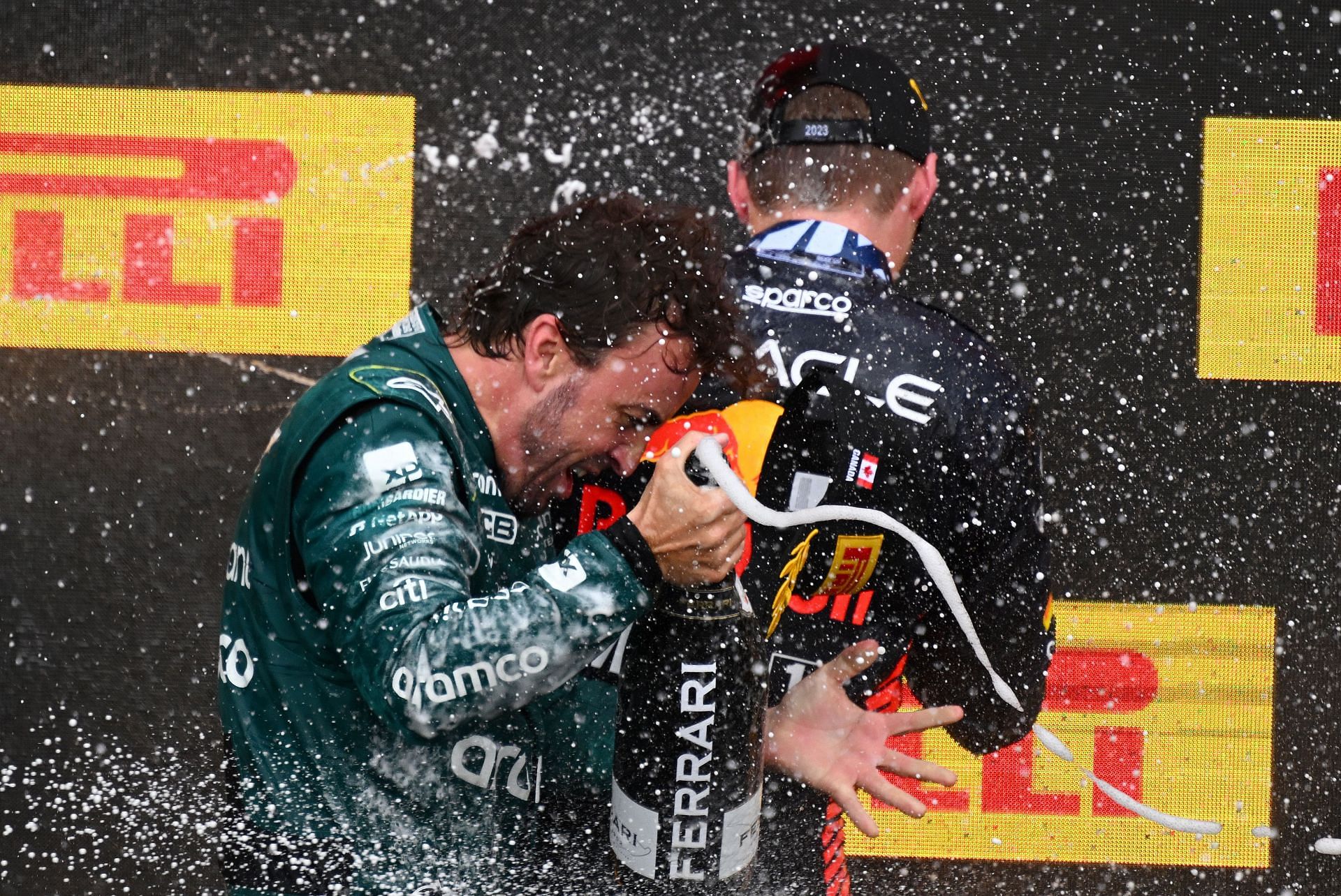 Alonso celebrates on the podium after the 2023 Canadian Grand Prix (Photo by Clive Mason/Getty Images)